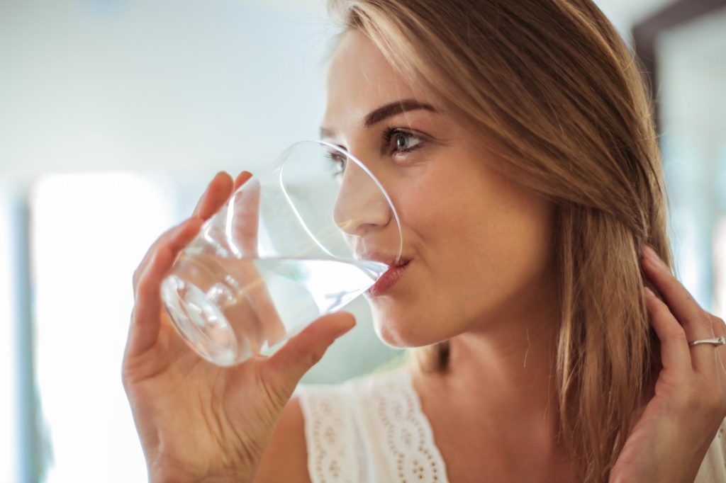 woman healthy drinking water