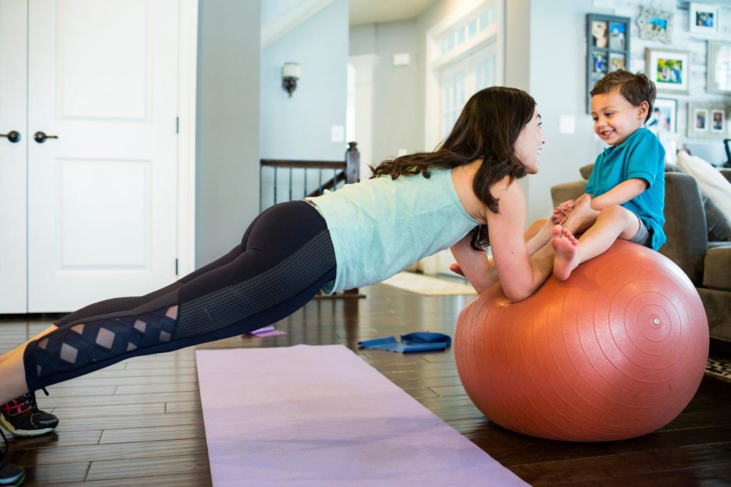 mother and child exercising having a healthy lifestyle