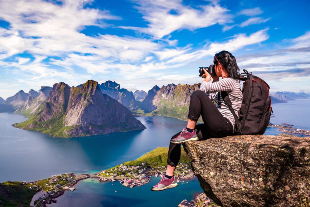 girl shooting her journey to make money while travelling