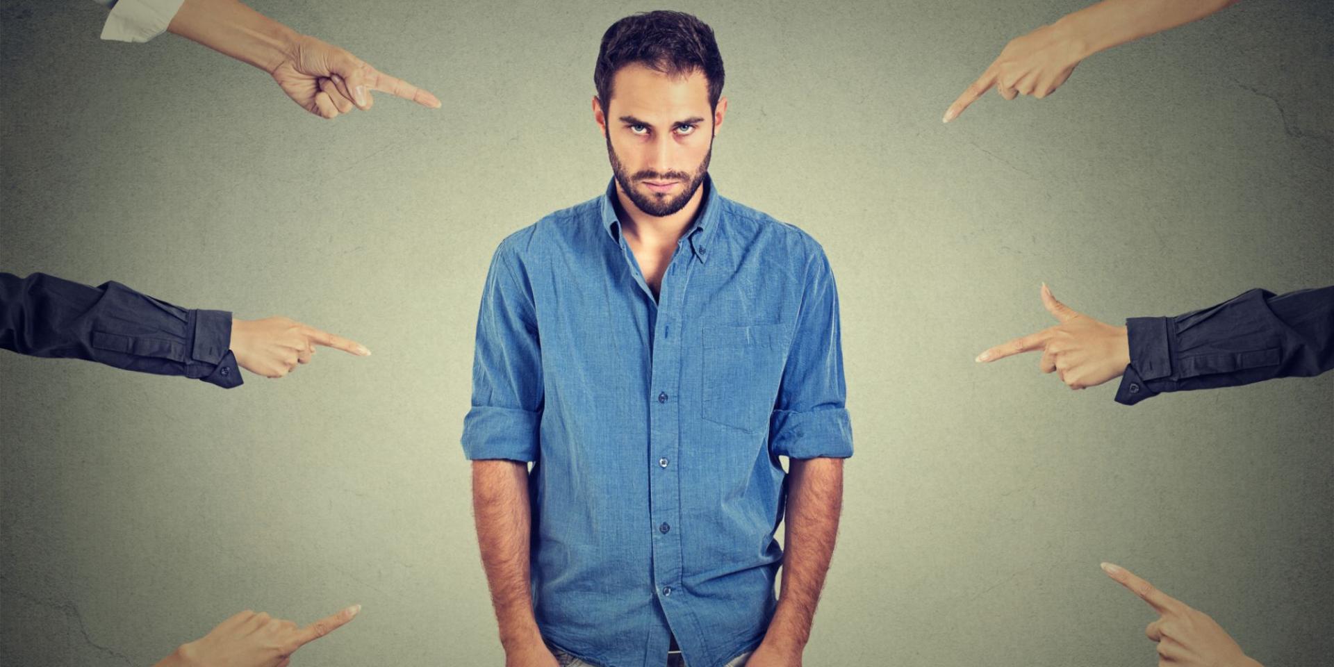 man in blue shirt trying to defeat fear of failure
