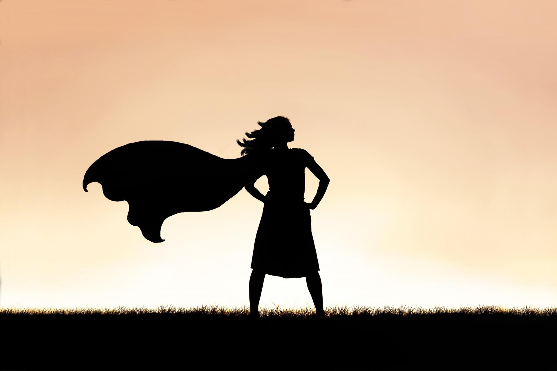 a woman silhouette with cape showing that she belongs to power people